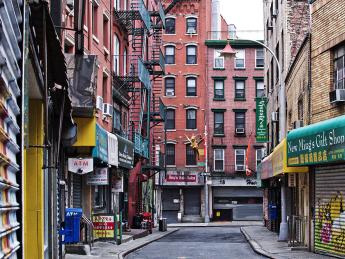 Photograph of vacant streets and closed shops and restaurants in Manhattan's Chinatown