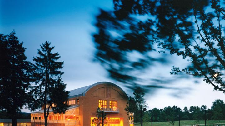 Seiji Ozawa Hall at Tanglewood, the summer home of the Boston Symphony Orchestra, in Lenox, Massachusetts. The hall opened in 1994. With the &ldquo;barn door&rdquo; open, picnickers enjoy a concert.