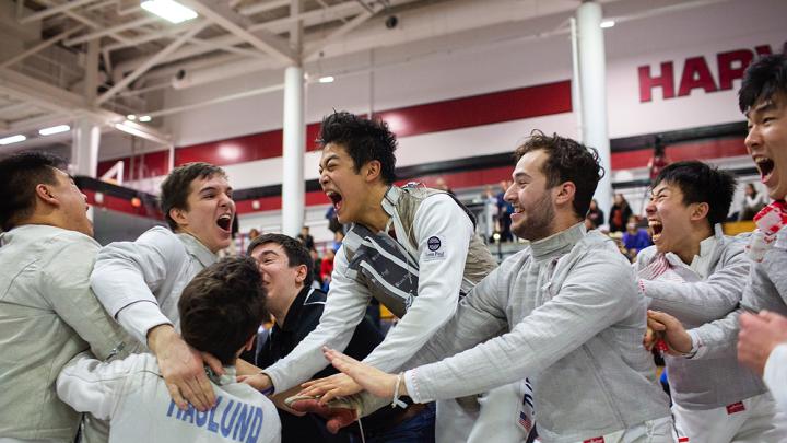 The Harvard men celebrate their championship win.