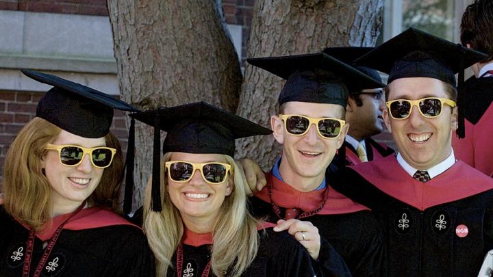 Loyal to their M.B.A. cohort: Carolyn Daly, Stephanie Bartz, Robert Klaber, and Randy Shayler II showed up in matching “HBS Section J 2012” shades. 